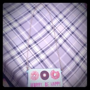 Doughnut purse w/portable charger.